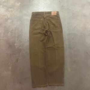 Vintage USA made Levi's 550 green faded‎ lightly distressed jeans